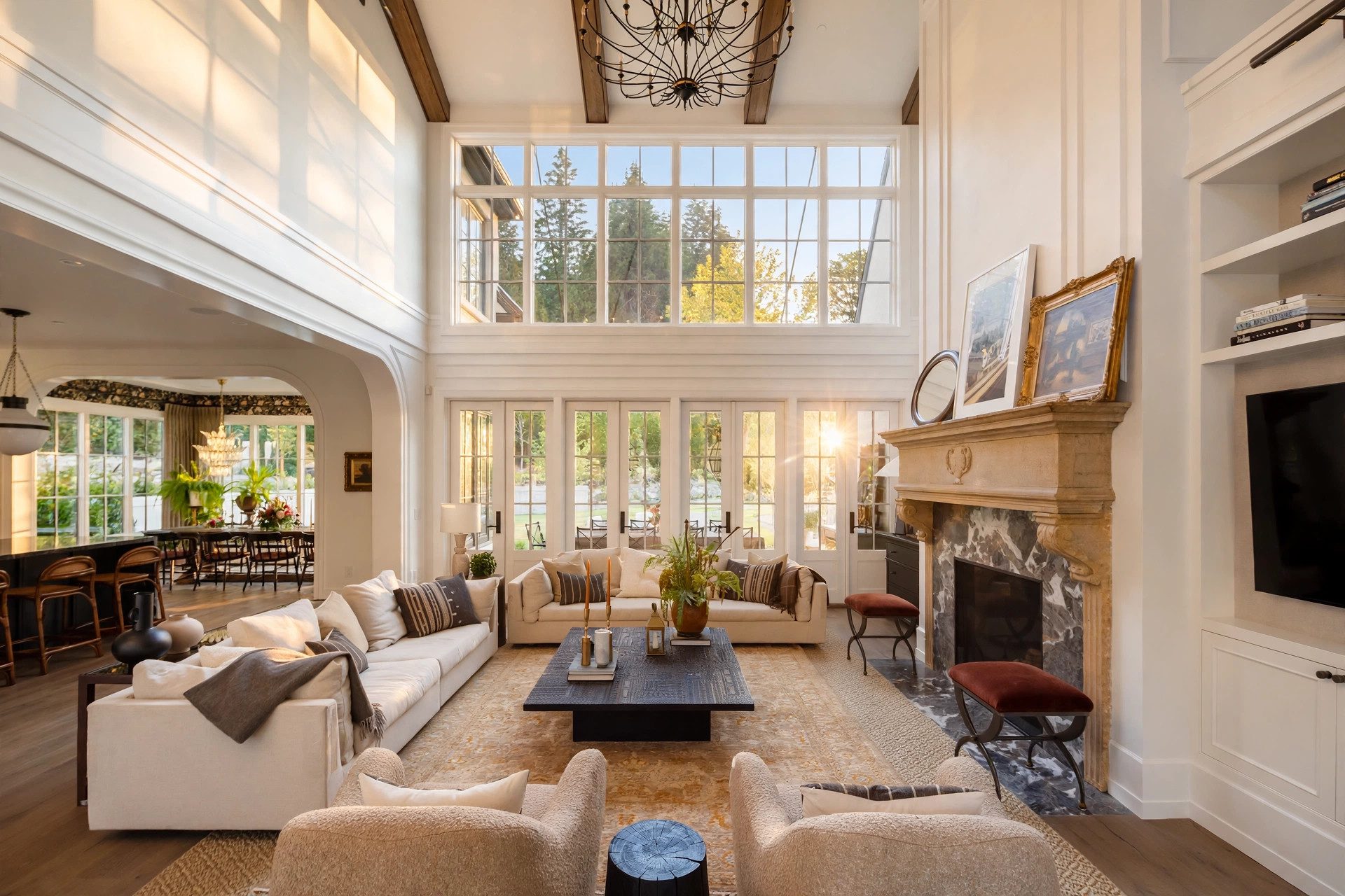 Bright great room with a stone fireplace and open kitchen